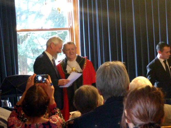Receiving the medal from the Lord Mayor