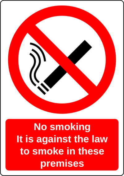 Sign reads No smoking. It is against the law to smoke in these premises