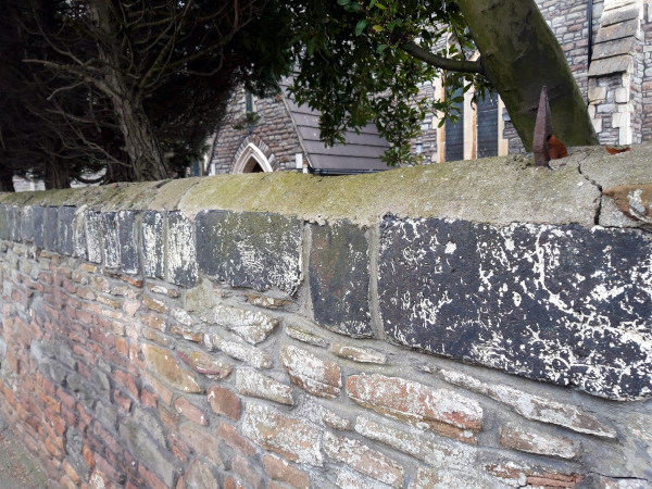 Greek Orthodox Curch wall with slag copings