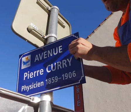 Street sign for Avenue Pierre Curry