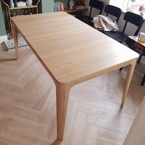After - table with new, light coloured finish